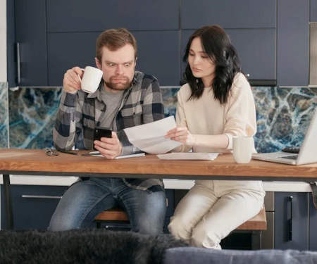Photo of worried looking couple